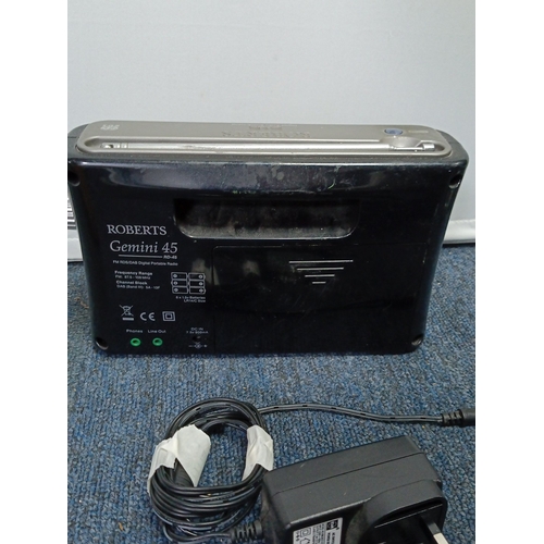 85 - A group of domestic electricals comprising a chrome-effect oscillating table fan with wire guard, He... 