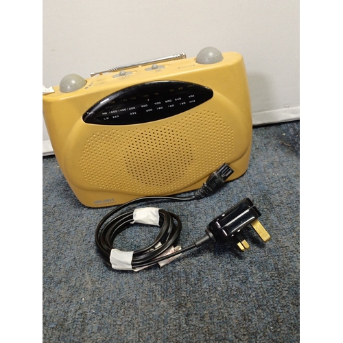 85 - A group of domestic electricals comprising a chrome-effect oscillating table fan with wire guard, He... 