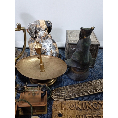 86 - A mixed lot of decorative and utilitarian objects, including a Blackpool tower model, brass and copp... 