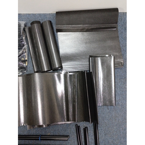 87 - A quantity of black plastic modular components to make a portable shelving unit.