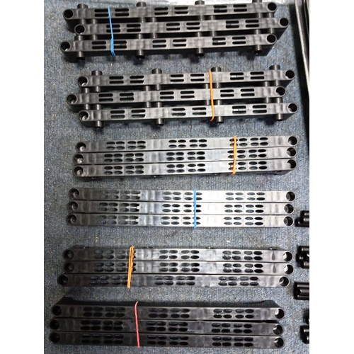 87 - A quantity of black plastic modular components to make a portable shelving unit.