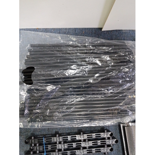 87 - A quantity of black plastic modular components to make a portable shelving unit.