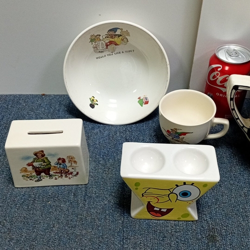 91 - A group of ceramic wares including a large floral-decorated enamel chamber pot with cover, a child’s... 