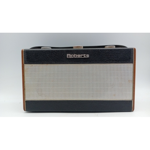 92 - Roberts solid-state portable radio, Model RIC.1—black rexine case with simulated wood ends, woven sp... 
