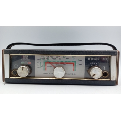 92 - Roberts solid-state portable radio, Model RIC.1—black rexine case with simulated wood ends, woven sp... 