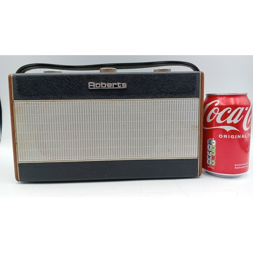 92 - Roberts solid-state portable radio, Model RIC.1—black rexine case with simulated wood ends, woven sp... 
