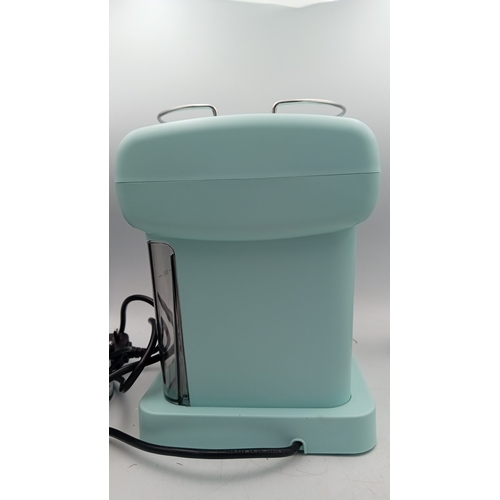 93 - SilverCrest espresso machine, model SEM 1050 A1, in aqua with chrome trim and dial temperature gauge... 
