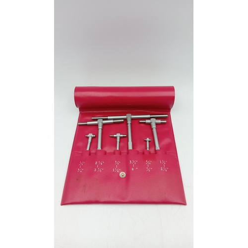 96 - A group of precision engineering measuring tools, including a Mercer Model 107 dial indicator and cl... 