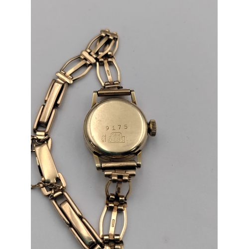 379 - A gold Roamer Incabloc 17 ladies wrist watch with original receipt watch case stamped .585/14 CT gol... 