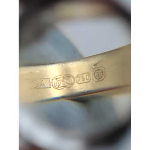 382 - A .750 stamped 18ct gold ring featuring 9 diamonds with box.(Size O) Weight 3.75 Grams.