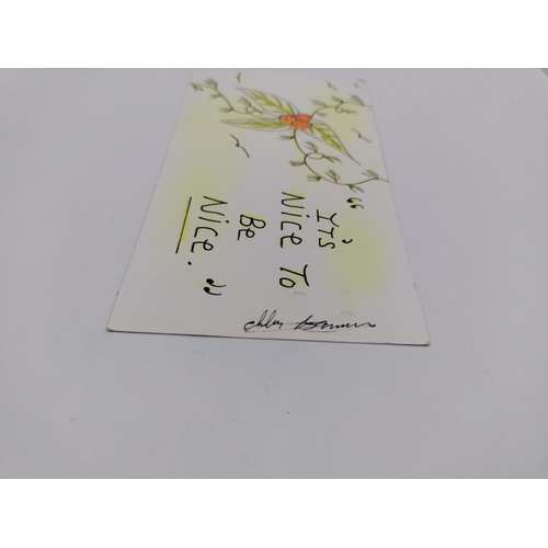 106 - A signed Charles Bronson postcard featuring drawings 
