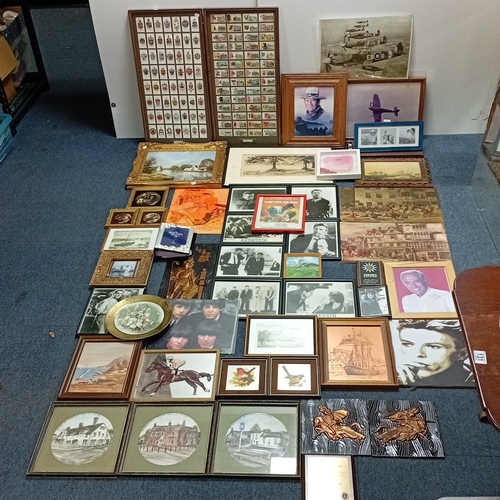 108 - A quantity of framed prints and photographs, including aviation subjects, film and popular-music ima... 