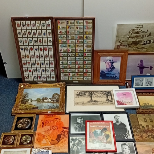 108 - A quantity of framed prints and photographs, including aviation subjects, film and popular-music ima... 