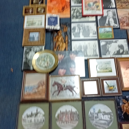 108 - A quantity of framed prints and photographs, including aviation subjects, film and popular-music ima... 