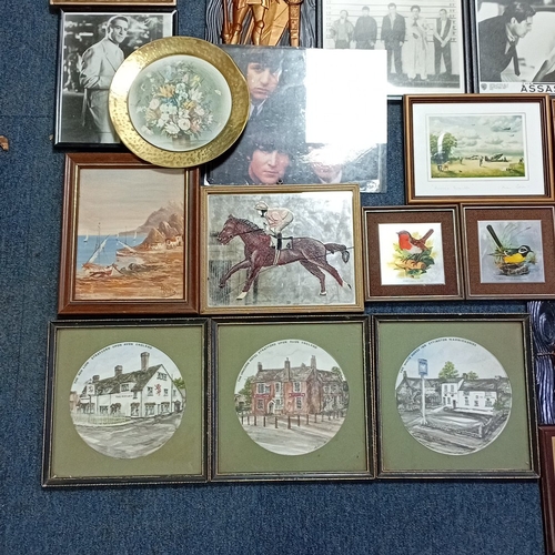 108 - A quantity of framed prints and photographs, including aviation subjects, film and popular-music ima... 