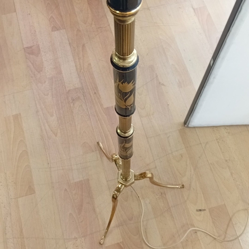 98 - Mid-20th century brass standard lamp, the fluted column with black painted reserves decorated with g... 