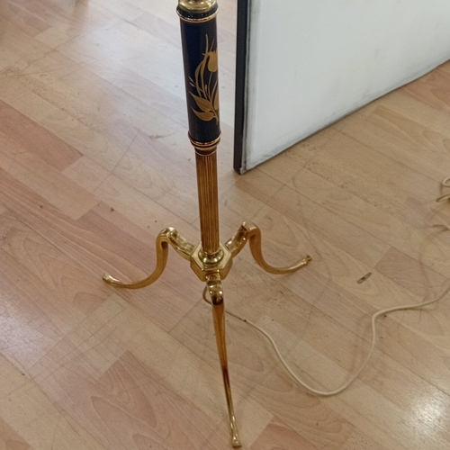 98 - Mid-20th century brass standard lamp, the fluted column with black painted reserves decorated with g... 