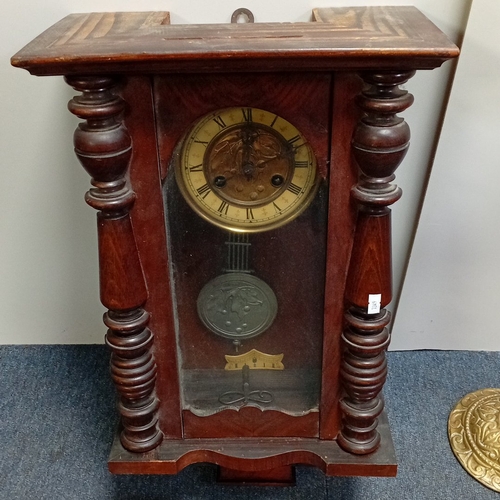 99 - Late 19th century walnut wall clock of architectural form, with barleytwist columns and glazed door ... 