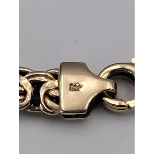 389 - A .375 stamped 9ct rose gold Byzantine link necklace. Length 17 inches. Weight 12.7 Grams.