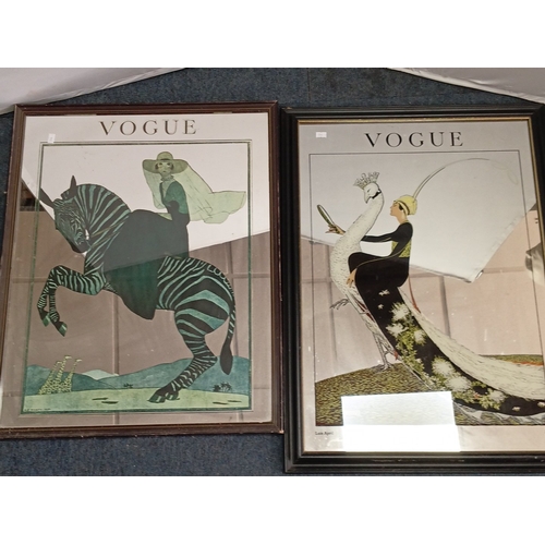 116 - A pair of framed Vogue cover advertising mirrors reproductions after George Lepape—one depicting an ... 