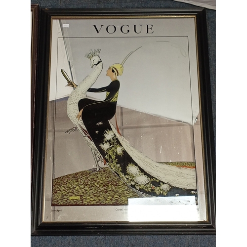 116 - A pair of framed Vogue cover advertising mirrors reproductions after George Lepape—one depicting an ... 