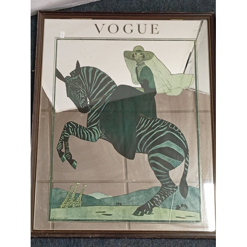 116 - A pair of framed Vogue cover advertising mirrors reproductions after George Lepape—one depicting an ... 