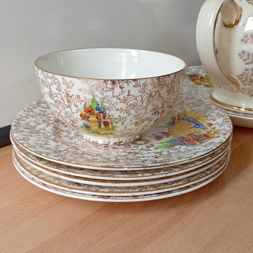 26 - Empire England bone china part tea service, decorated with gilt floral scrollwork and polychrome pas... 