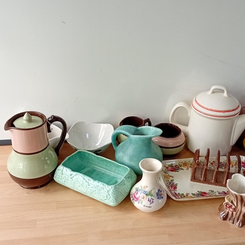 28 - A mixed lot of mid-20th century ceramic tablewares and ornaments, including an earthenware teapot, j... 