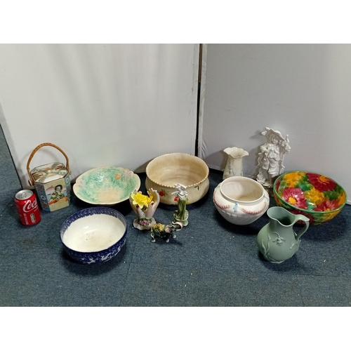 31 - A quantity of assorted decorative ceramics, including a polychrome flower-painted bowl, blue-and-whi... 