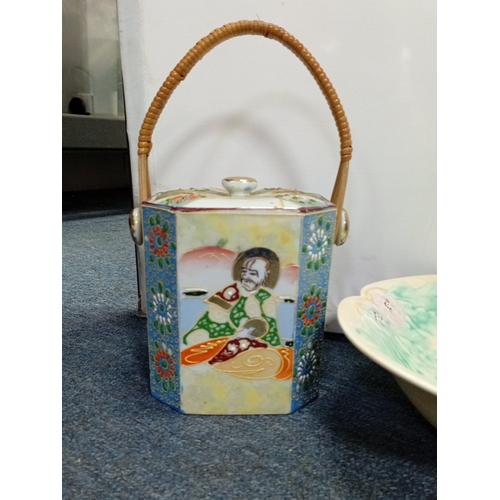 31 - A quantity of assorted decorative ceramics, including a polychrome flower-painted bowl, blue-and-whi... 