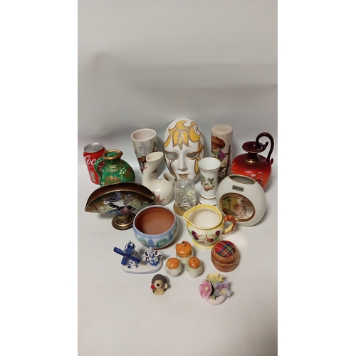 35 - A quantity of mixed ceramics including floral-decorated tea wares, transfer-printed and souvenir dis... 
