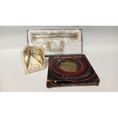 36 - A mixed group of 20th century domestic and decorative items including a mantel clock, framed nautica... 
