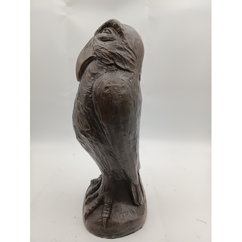 252 - A Wally Bird Style patinated bronze grotesque bird after Martin Brothers. Height 10 1/2 inches.