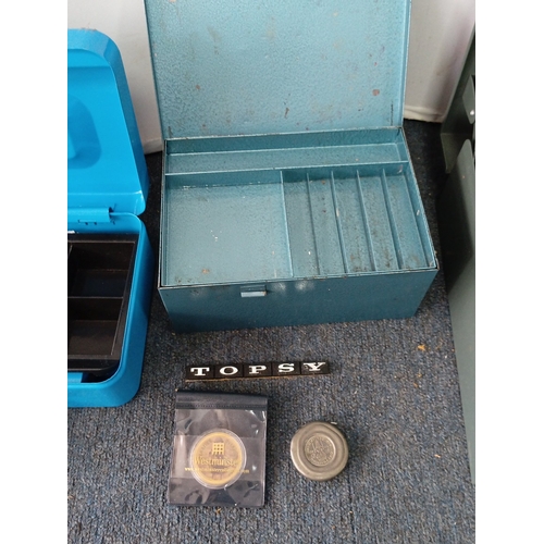 2 - A group of mid-20th century cash-handling accessories comprising three painted-metal lockable cash b... 