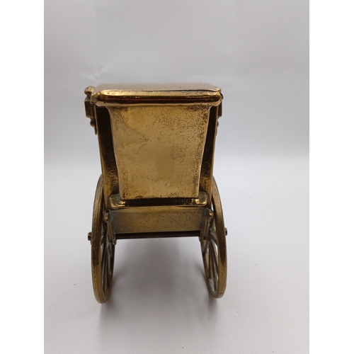 5 - A pair of brass horse-drawn carriage models, each with canopy, glazed windows, spoked wheels and har... 