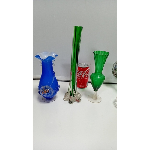 6 - An assortment of decorative glass and stained-glass work, comprising emerald and cobalt vases, a gre... 