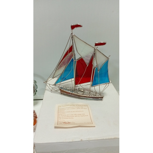 6 - An assortment of decorative glass and stained-glass work, comprising emerald and cobalt vases, a gre... 