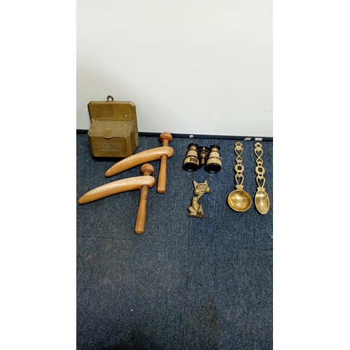 23 - An assortment of small decorative objects comprising a brass wall-mounted salt box, a pair of turned... 