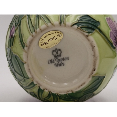 42 - Two Old Tupton Ware ceramics comprising two hand-painted vases with raised floral decoration and a R... 