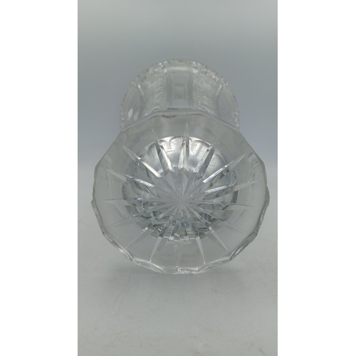 53 - Cut crystal vase of flared polygonal form, with serrated rim, alternating panels of prism-cut starbu... 