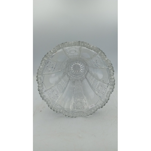 53 - Cut crystal vase of flared polygonal form, with serrated rim, alternating panels of prism-cut starbu... 