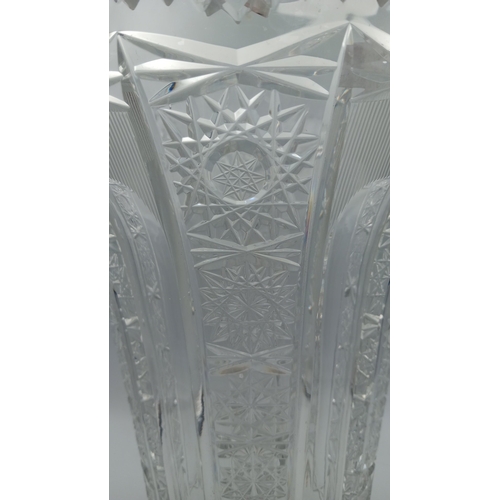 53 - Cut crystal vase of flared polygonal form, with serrated rim, alternating panels of prism-cut starbu... 