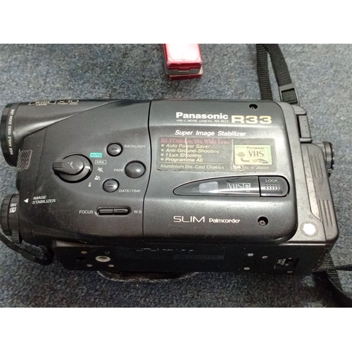 55 - A group of vintage consumer electronics including Panasonic NV-R33 VHS-C Palmcorder, Samsung VP-W70 ... 