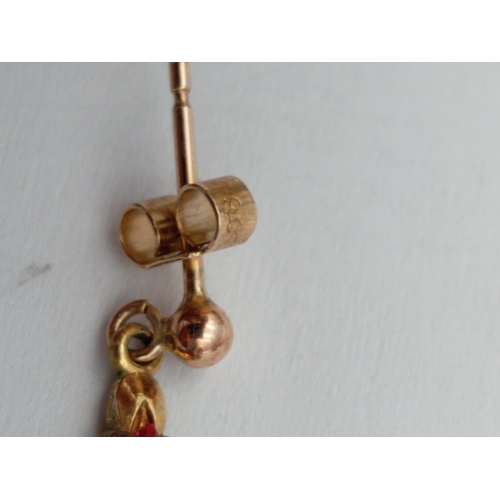 116 - A collection of 9ct gold & yellow metal earrings & loose stones. Total weight 15.19 grams.