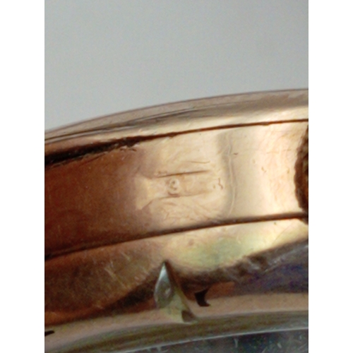 131 - A 9ct hallmarked gold Thomas Russell and Son ladies wristwatch. Total weight 18.4 Grams. In working ... 