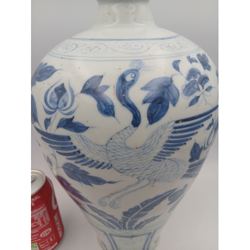 275 - A large antique Chinese blue and white vase, decorated with birds and flowers. Height 31cm x Width 1... 