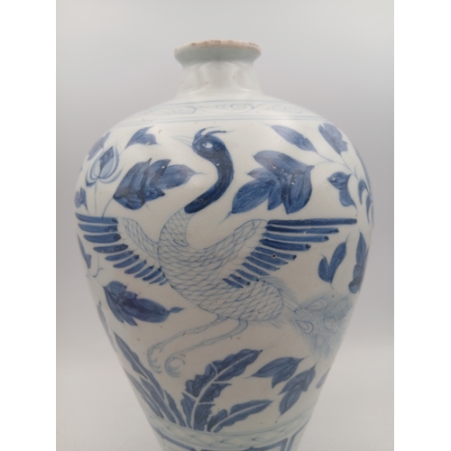275 - A large antique Chinese blue and white vase, decorated with birds and flowers. Height 31cm x Width 1... 