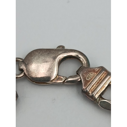 379 - A stamped 925 silver cuban link bracelet (Length 8.5 inches) and necklace (Length 20 inches). Weight... 