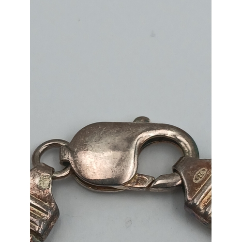 379 - A stamped 925 silver cuban link bracelet (Length 8.5 inches) and necklace (Length 20 inches). Weight... 
