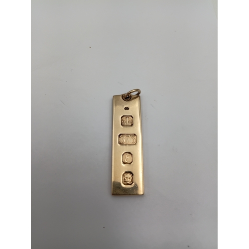 397 - A 9ct gold ingot with hallmarks. Weight 14.81 grams